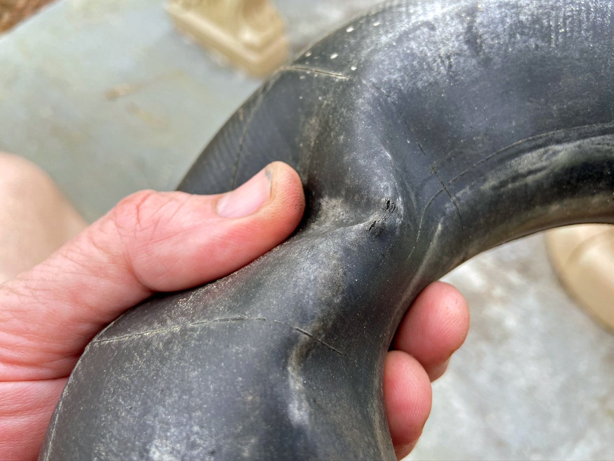 Pinched innertube was leaking badly (Photo © Russ Chastain)