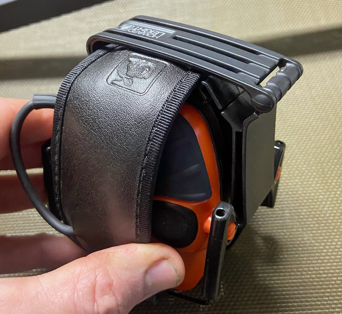 The clip folds out of the way for storing the headset (Photo © Russ Chastain)