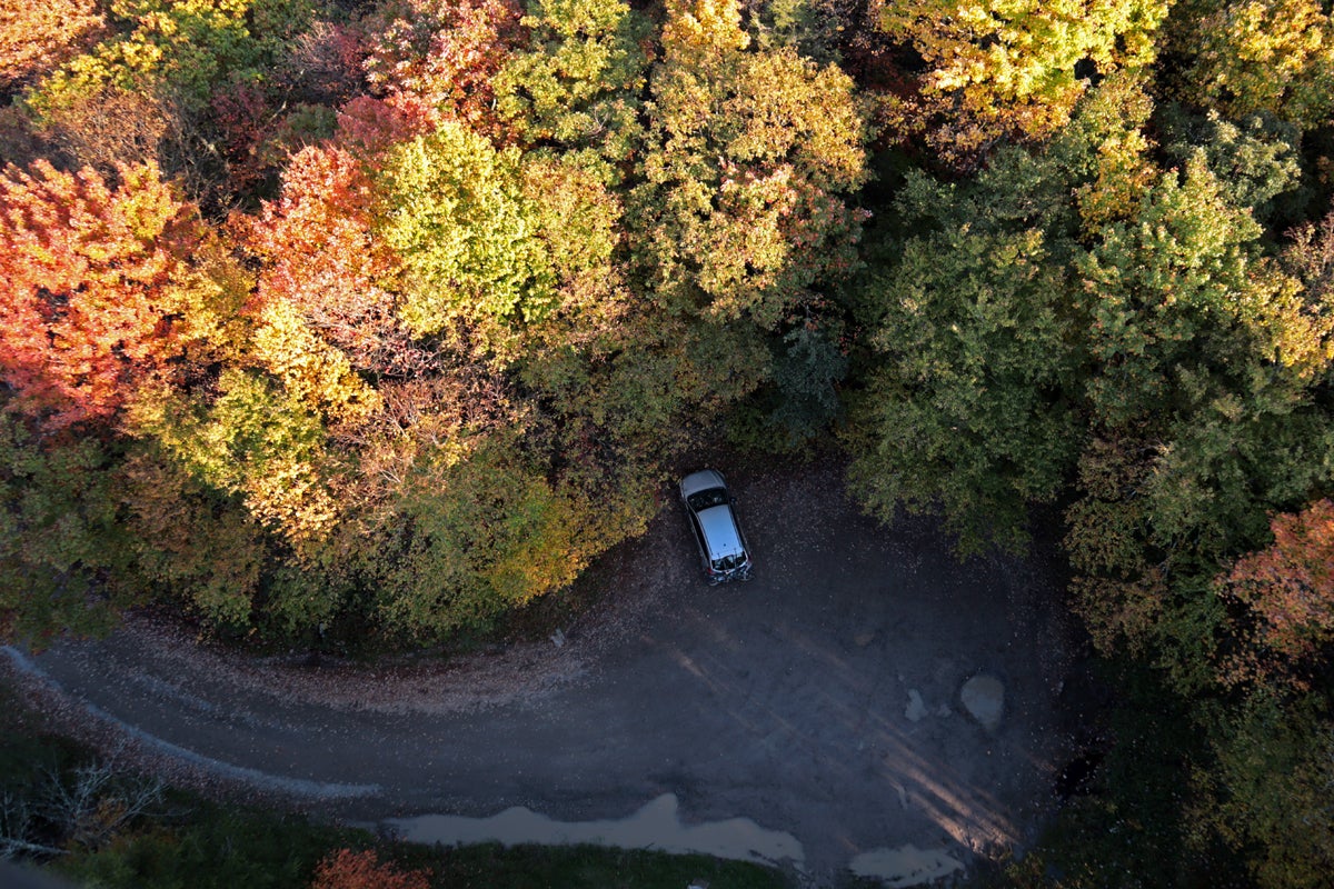 Leaf peeping season fall foliage colors hiking camping biking tourism