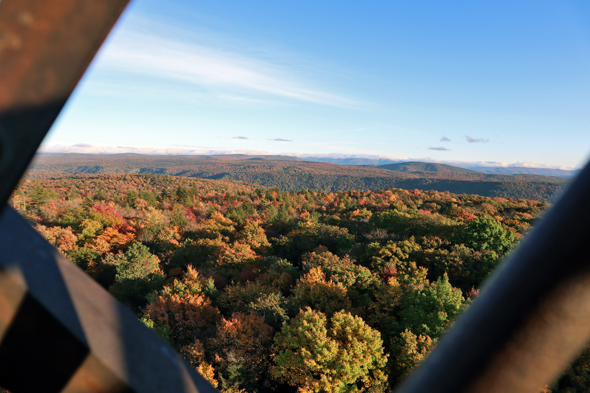 Leaf peeping season fall foliage colors hiking camping biking tourism