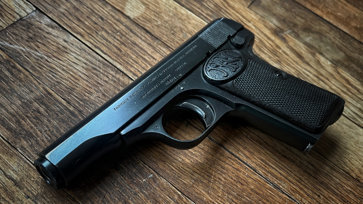 Curious Relics #036: Same Pistol Different Package – FN 1910 Curious Relics #036: Same Pistol Different Package – FN 1910